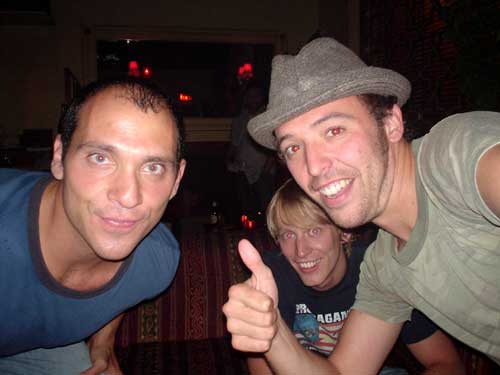 thumbs up + hat